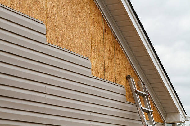 Professional Emergency Siding Repair technician working in Penn, PA